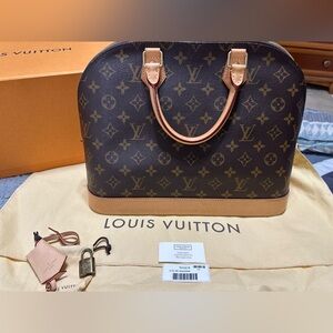 Louis Vuitton Authentic Alma MM Monogram bag